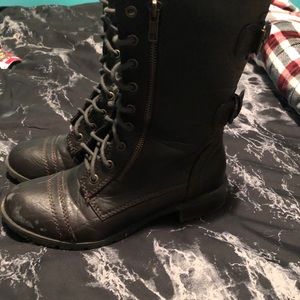 Laced up handmade leather style boots